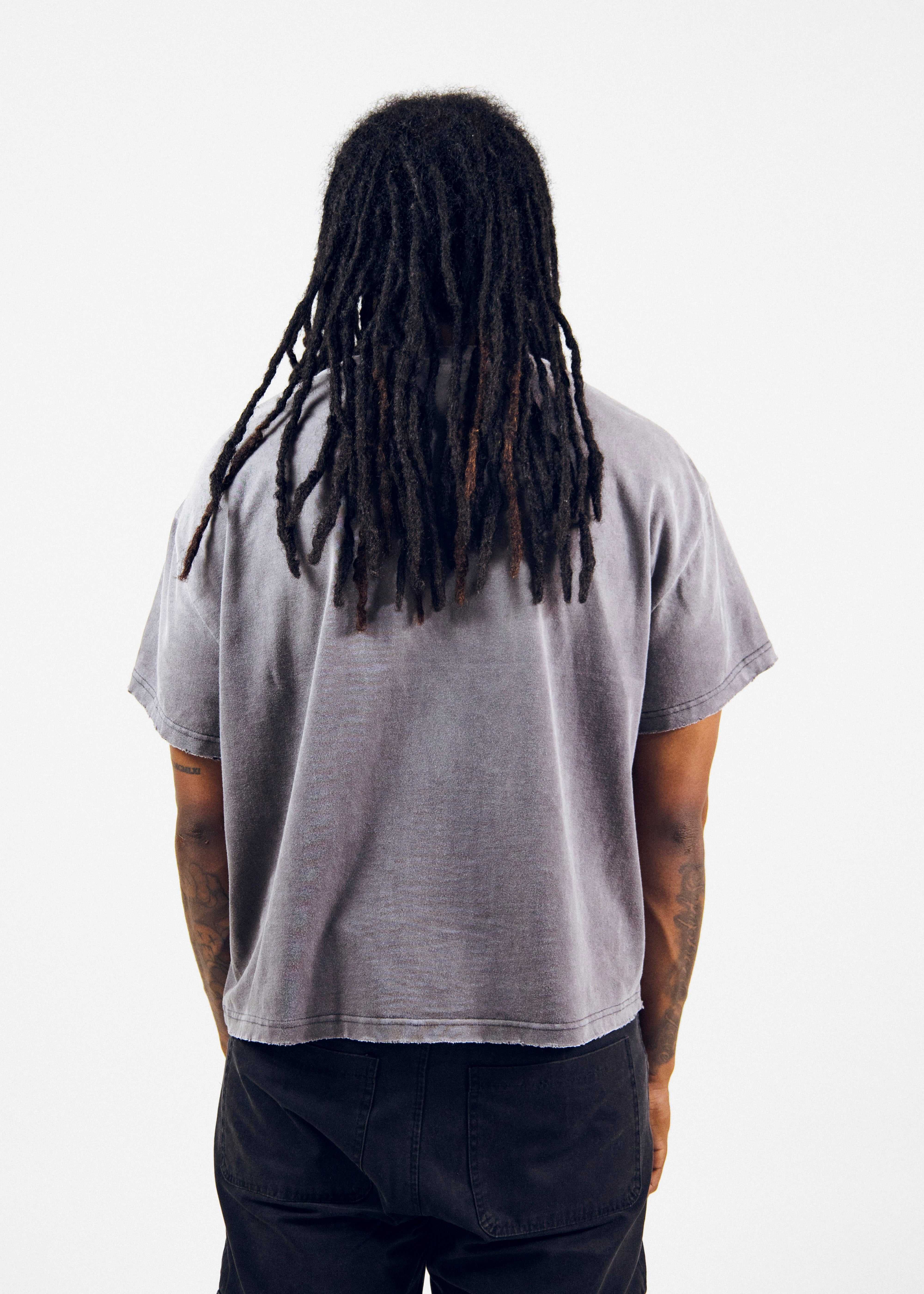 Fear Kills Art loose oversized fit t-shirt in faded charcoal wash with raw edges and distressed details on soft cotton fabric