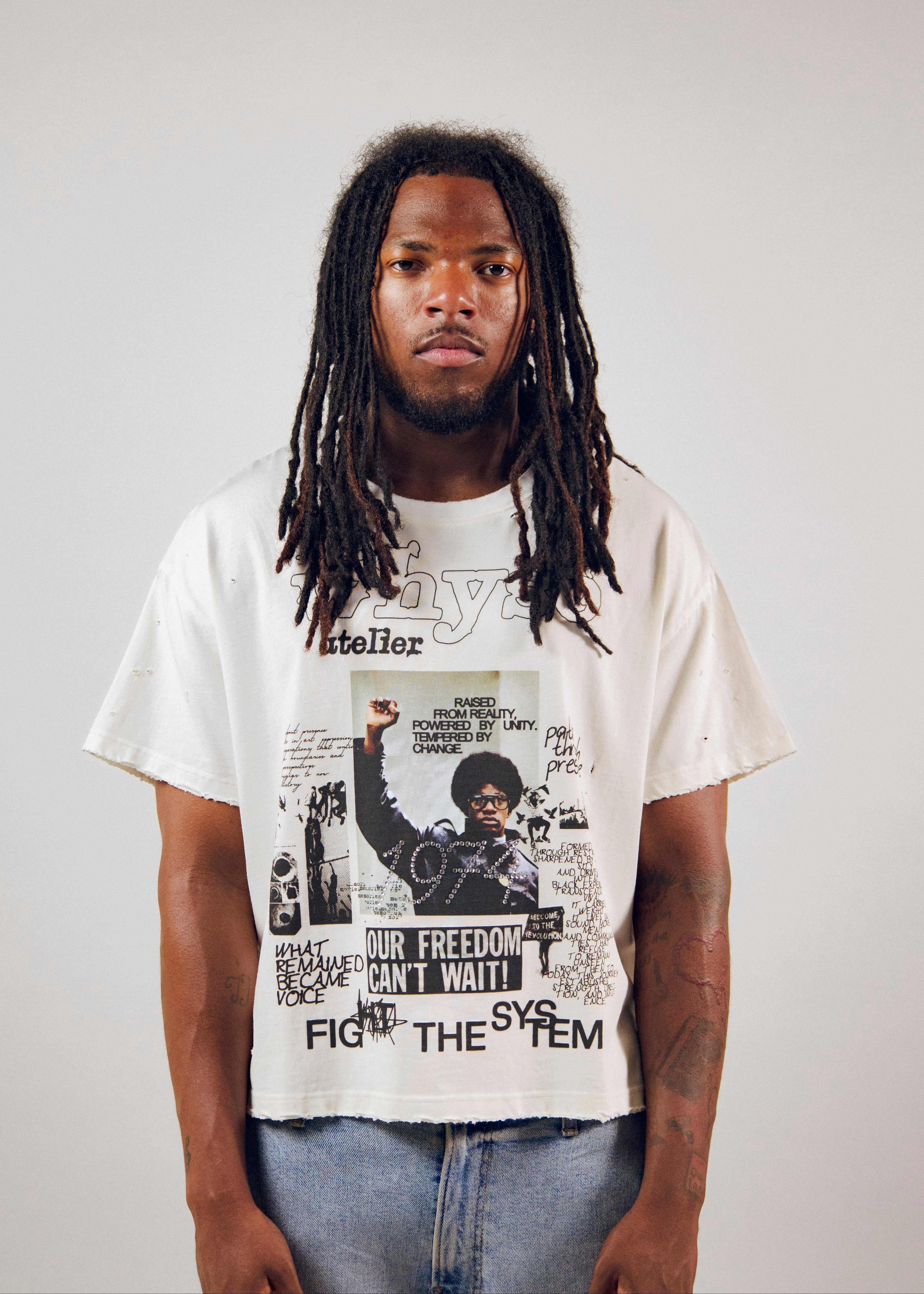 Fight The System T-Shirt in white cotton with boxy oversized fit, featuring bold black graphic print and raw hem
